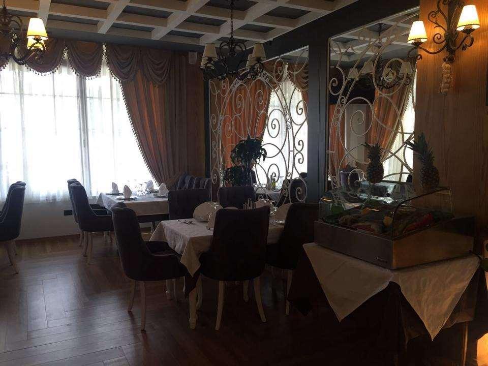 Hotel Mustang Vasqarr Ресторант снимка